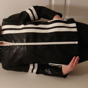 Black and white foux leather jacket.